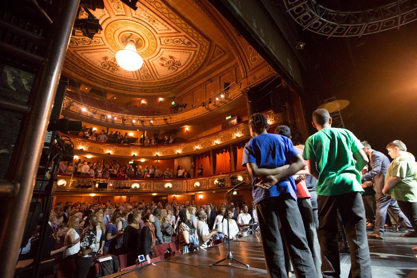 Coram Shakespeare Schools Foundation children on stage.